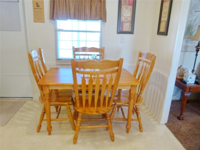 dining space featuring carpet floors