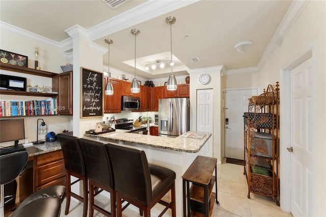 kitchen with light stone countertops, hanging light fixtures, stainless steel appliances, kitchen peninsula, and light tile patterned floors