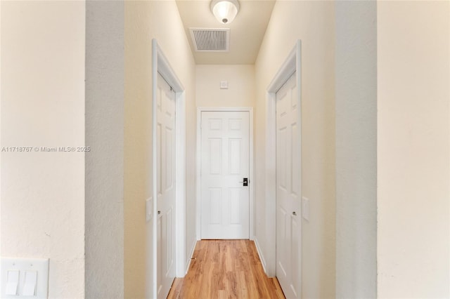 hall featuring light hardwood / wood-style flooring