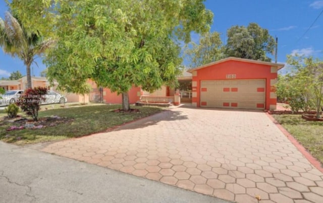 view of front of home with a garage