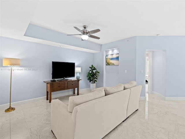 living room with ceiling fan