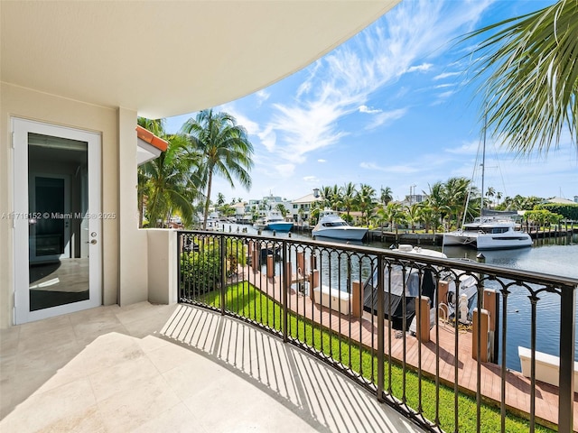 balcony featuring a water view