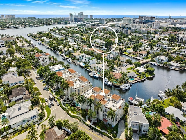 bird's eye view with a water view