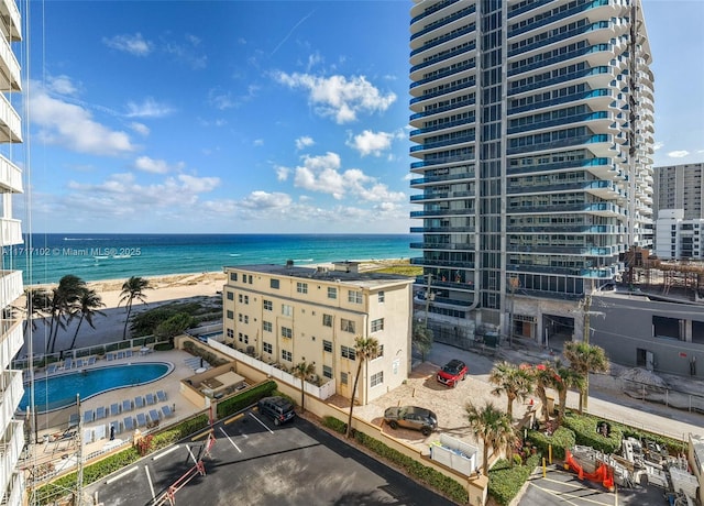 property view of water featuring a beach view