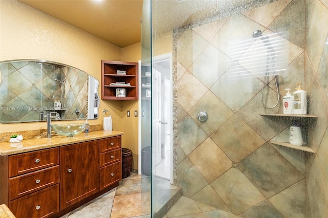 bathroom featuring vanity, walk in shower, and tasteful backsplash