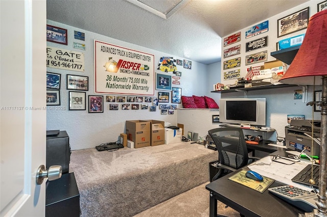 office featuring carpet and a textured ceiling