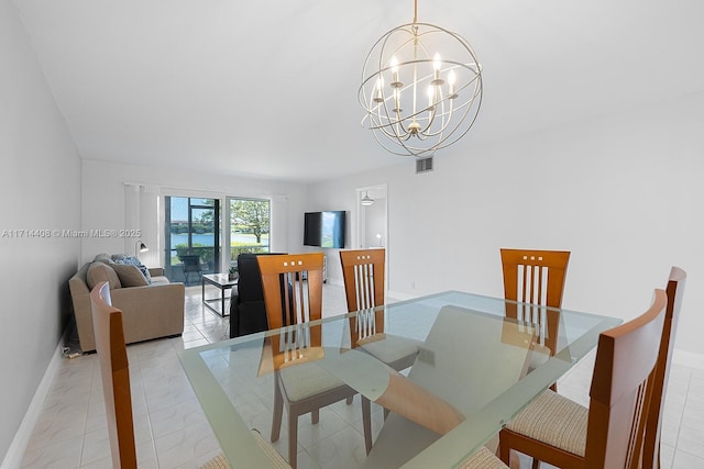 dining area featuring a chandelier