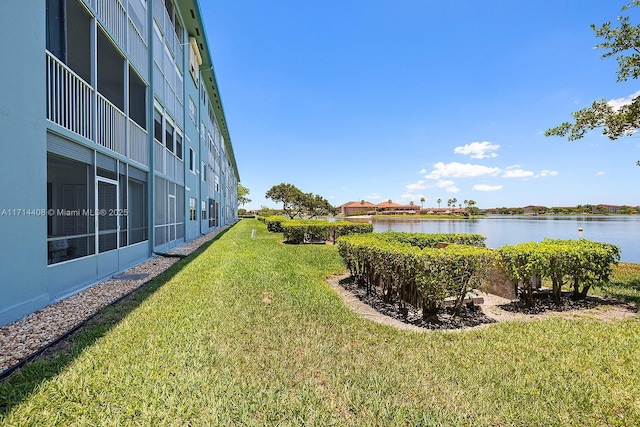 view of yard with a water view