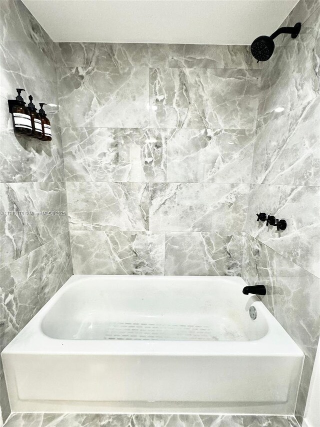 bathroom featuring bathtub / shower combination