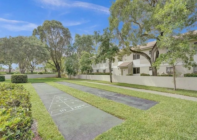 view of community with a lawn