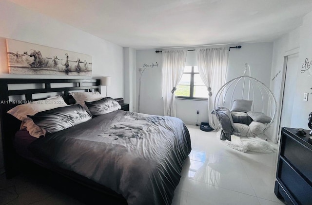 bedroom with tile patterned floors