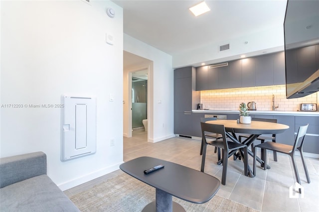 dining space featuring sink