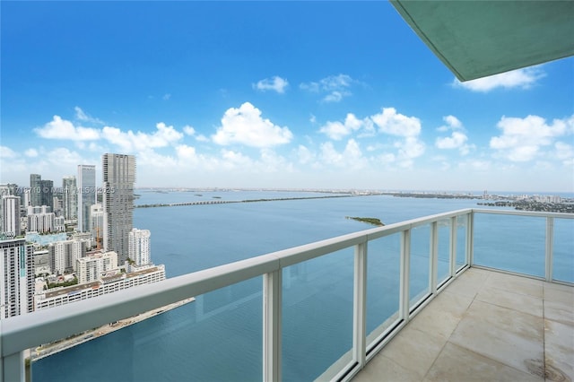 balcony featuring a water view