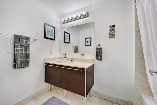 bathroom featuring vanity, shower / tub combo with curtain, and tile patterned floors