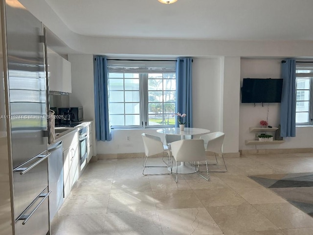 kitchen featuring white cabinets and stainless steel appliances