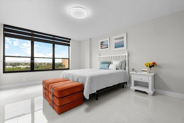 bedroom featuring light tile patterned floors