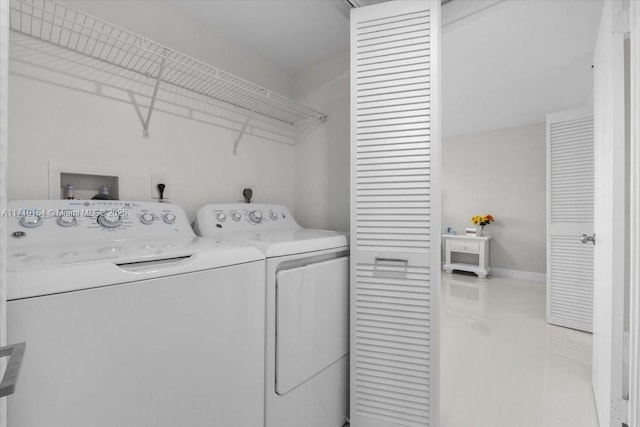 laundry room featuring independent washer and dryer