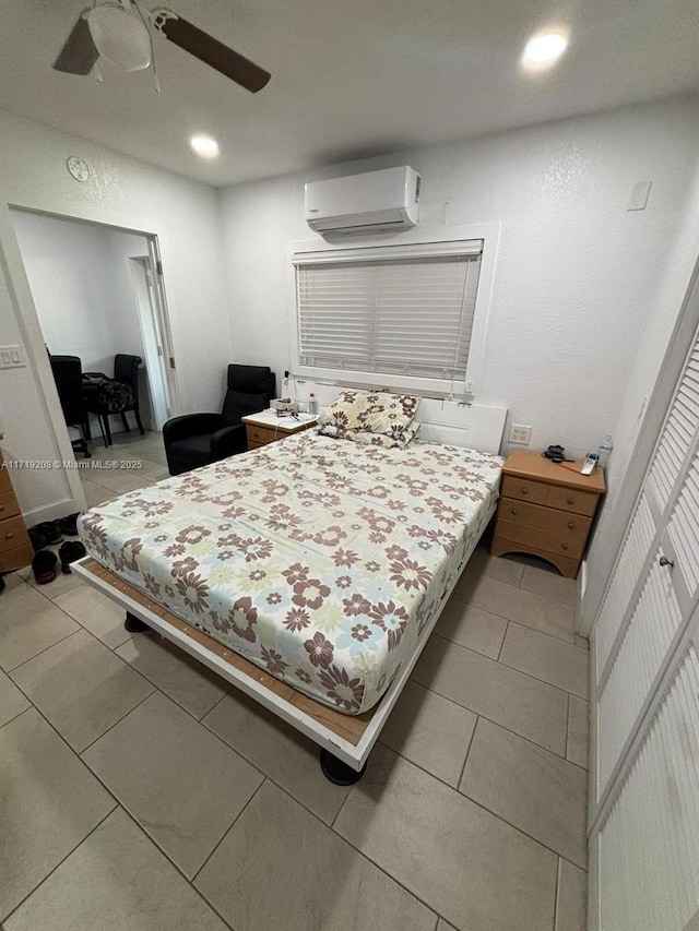 bedroom featuring light tile patterned floors, recessed lighting, a ceiling fan, and a wall mounted AC