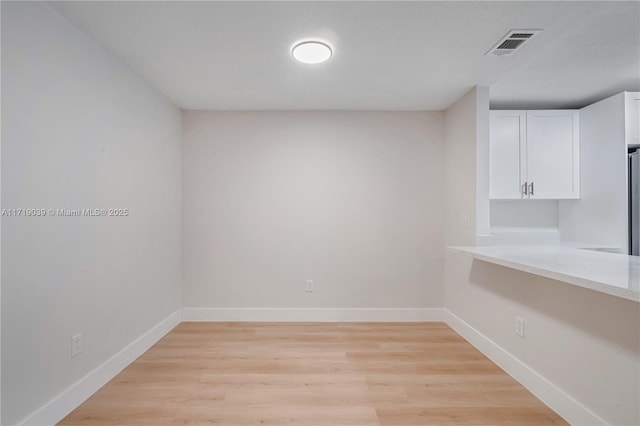 empty room featuring light wood-type flooring