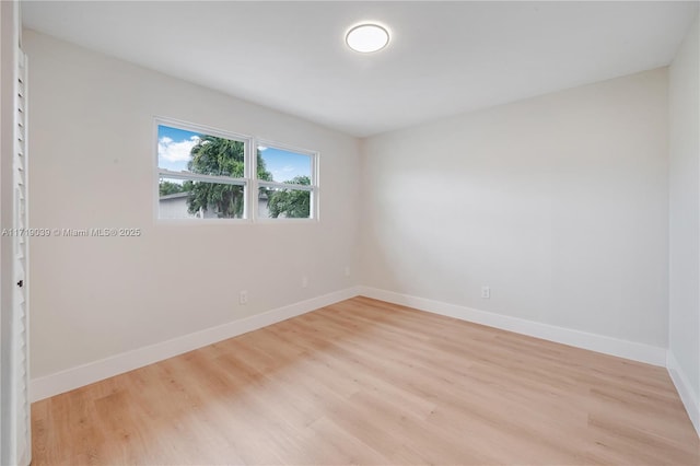 empty room with light wood-type flooring