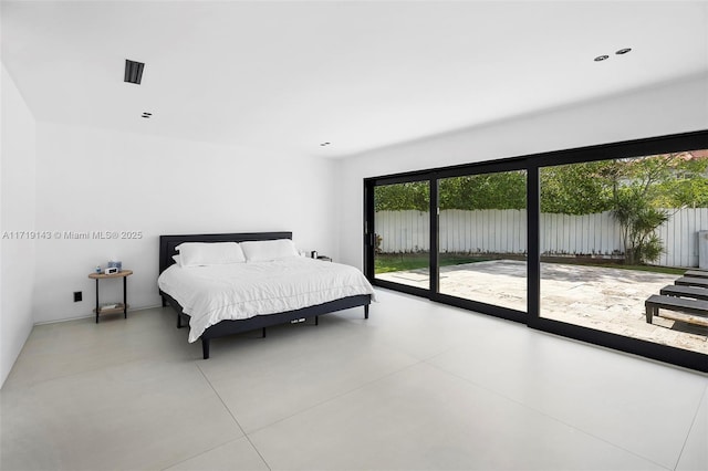 bedroom featuring access to outside