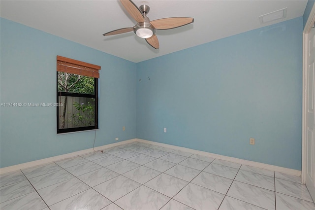 unfurnished room featuring ceiling fan