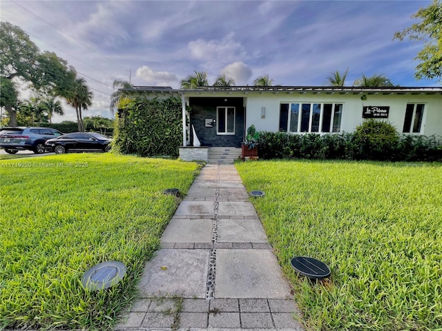 view of front of house with a front yard