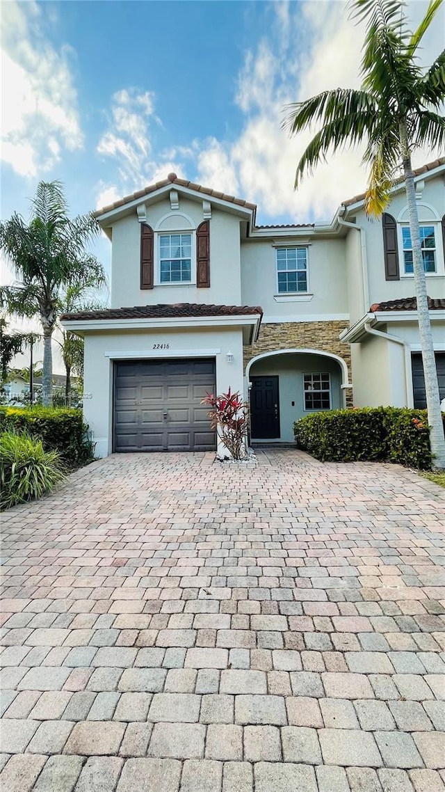 view of front of home with a garage