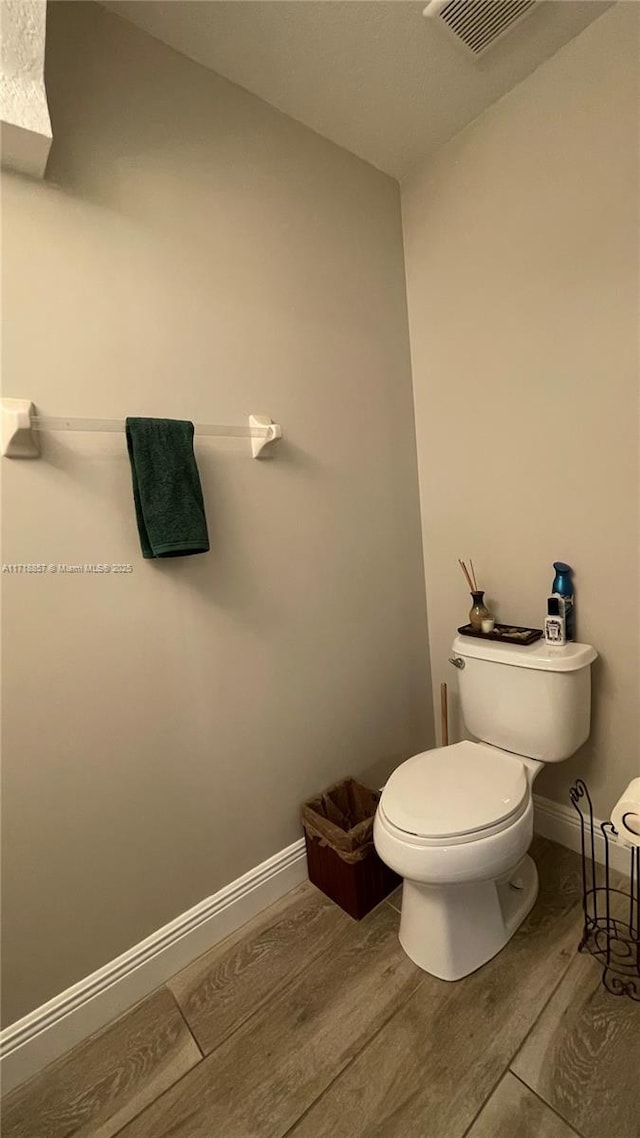 bathroom featuring toilet