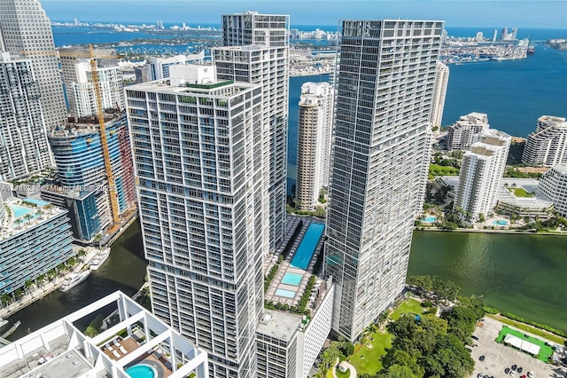 birds eye view of property with a water view