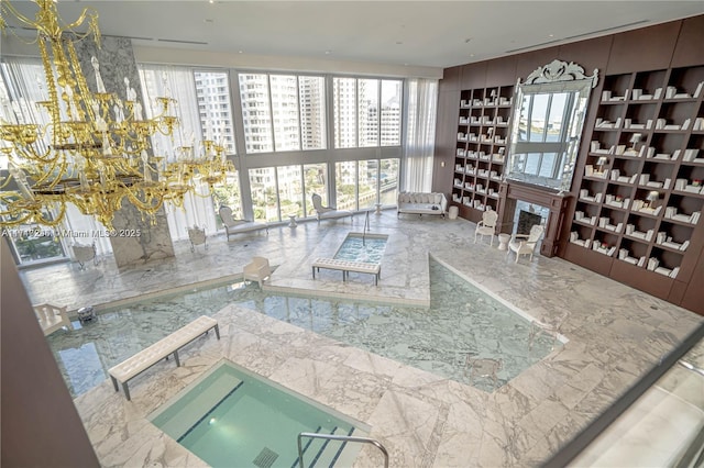 495 Brickell Ave Unit 2301, Miami, FL 33131 - living room featuring a chandelier