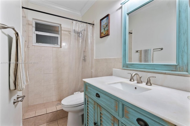 bathroom with tile patterned flooring, vanity, tile walls, toilet, and crown molding