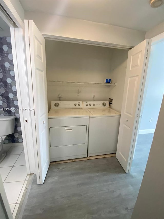 laundry area featuring washer and clothes dryer