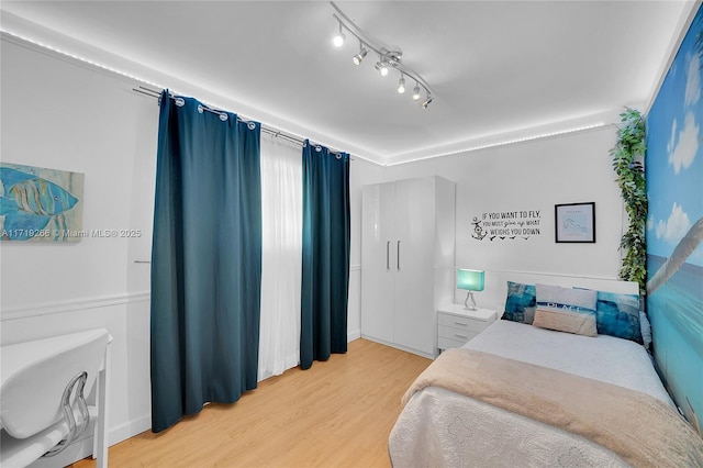 bedroom featuring hardwood / wood-style floors