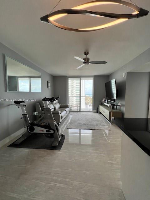 living room featuring ceiling fan