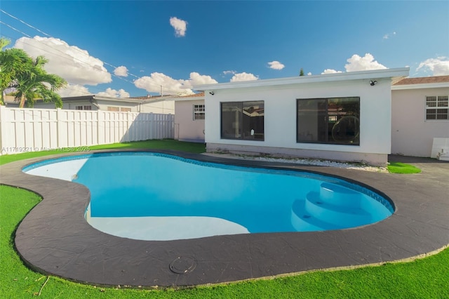 view of pool with fence and a fenced in pool