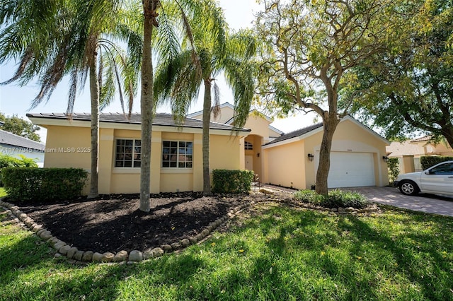 13080 NW 8th Ct, Sunrise, FL 33325 - ranch-style house featuring stucco siding, driveway, a front yard, and a garage