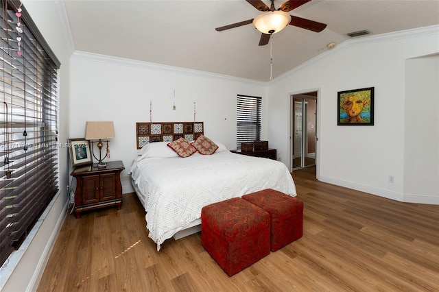 13080 NW 8th Ct, Sunrise, FL 33325 - bedroom featuring lofted ceiling, wood finished floors, ornamental molding, and ceiling fan