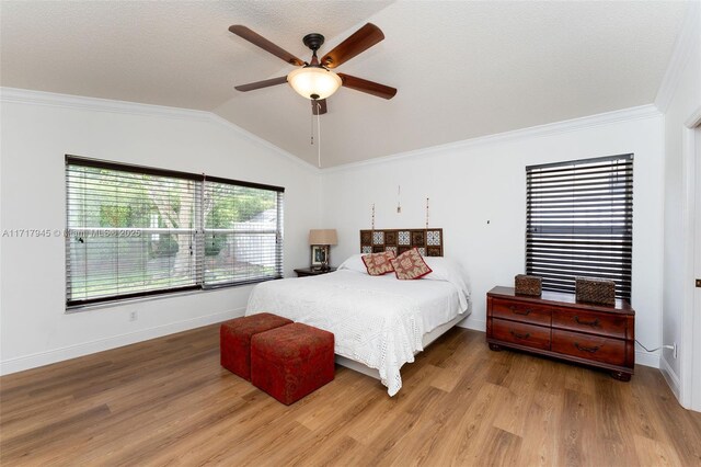 13080 NW 8th Ct, Sunrise, FL 33325 - bedroom with lofted ceiling, wood finished floors, crown molding, and ceiling fan