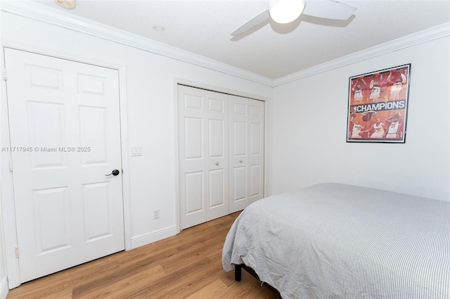 13080 NW 8th Ct, Sunrise, FL 33325 - bedroom with light wood-style floors, crown molding, ceiling fan, and a closet