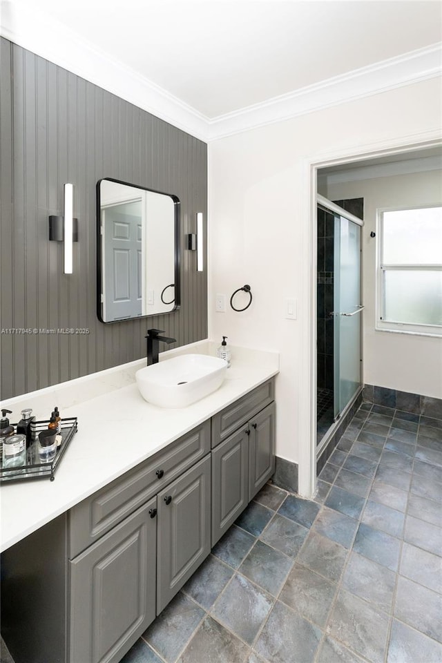 13080 NW 8th Ct, Sunrise, FL 33325 - bathroom with stone tile floors, vanity, a stall shower, and ornamental molding