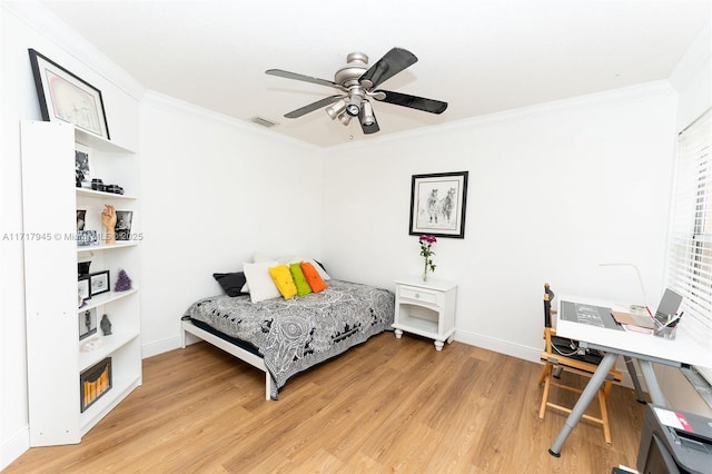 13080 NW 8th Ct, Sunrise, FL 33325 - bedroom with ornamental molding, light wood finished floors, a desk, and a ceiling fan
