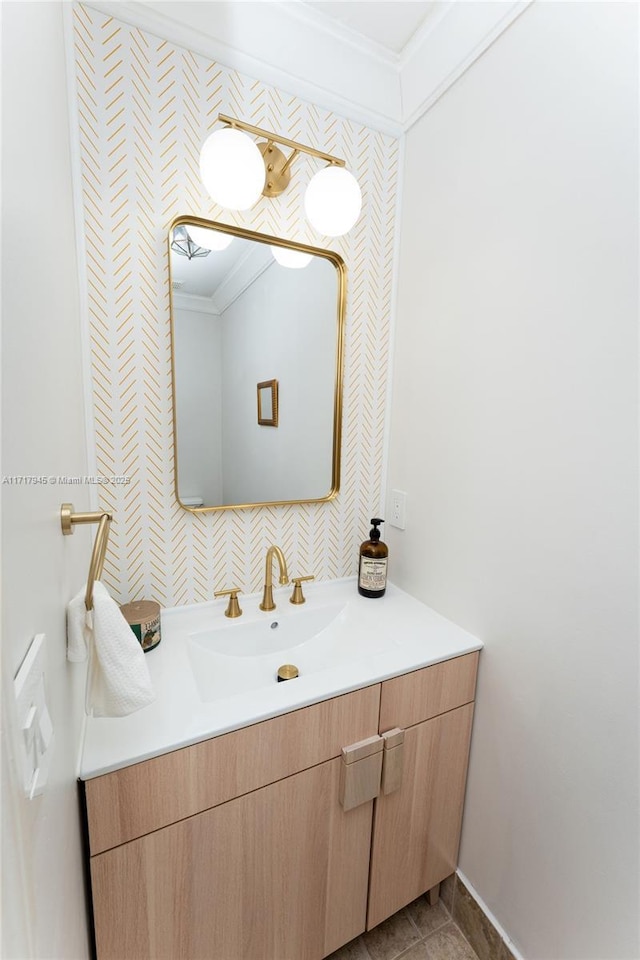13080 NW 8th Ct, Sunrise, FL 33325 - bathroom with wallpapered walls, vanity, ornamental molding, and tile patterned flooring