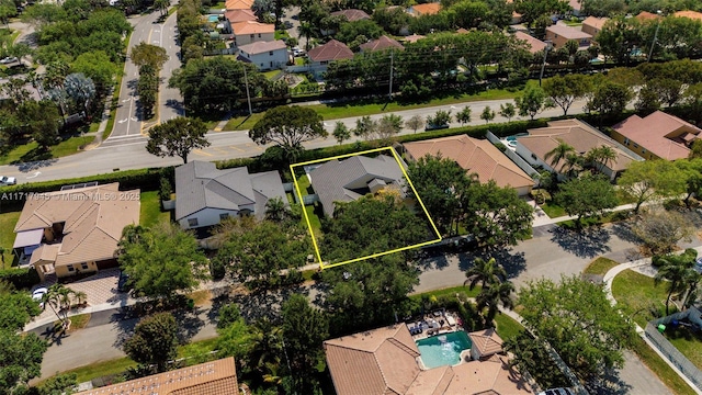 13080 NW 8th Ct, Sunrise, FL 33325 - aerial perspective of suburban area featuring property boundaries highlighted and a pool