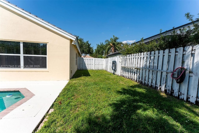 13080 NW 8th Ct, Sunrise, FL 33325 - fenced backyard with a patio