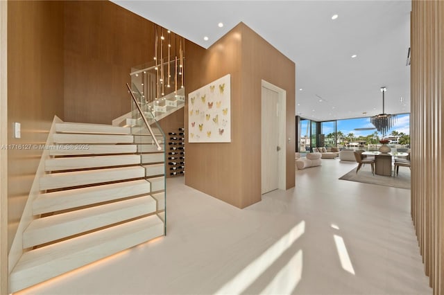 315 N Shore Dr, Miami Beach, FL 33141 - stairway with a wall of windows and recessed lighting