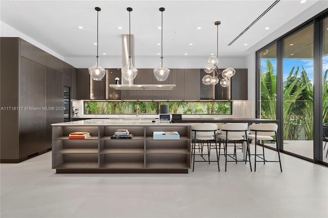 315 N Shore Dr, Miami Beach, FL 33141 - bar with decorative backsplash, recessed lighting, an inviting chandelier, and decorative light fixtures