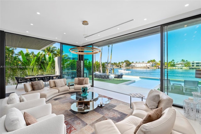 315 N Shore Dr, Miami Beach, FL 33141 - interior space with a water view, recessed lighting, and floor to ceiling windows