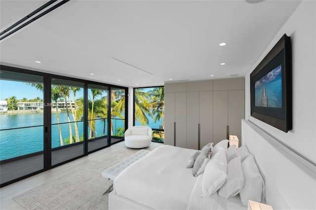 315 N Shore Dr, Miami Beach, FL 33141 - bedroom featuring a water view, recessed lighting, floor to ceiling windows, and access to outside