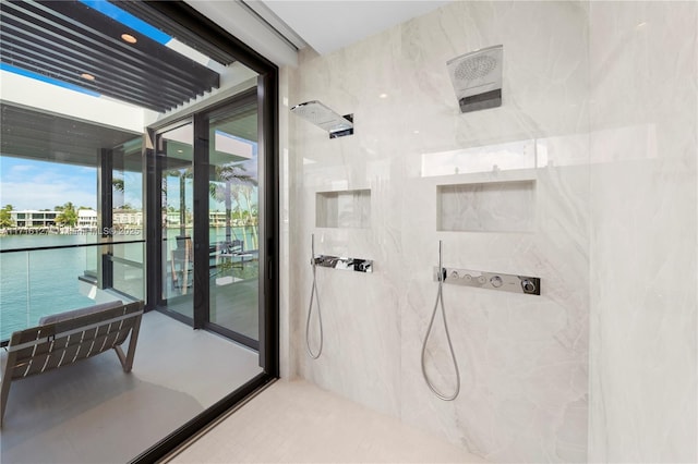 315 N Shore Dr, Miami Beach, FL 33141 - bathroom with a marble finish shower and a water view